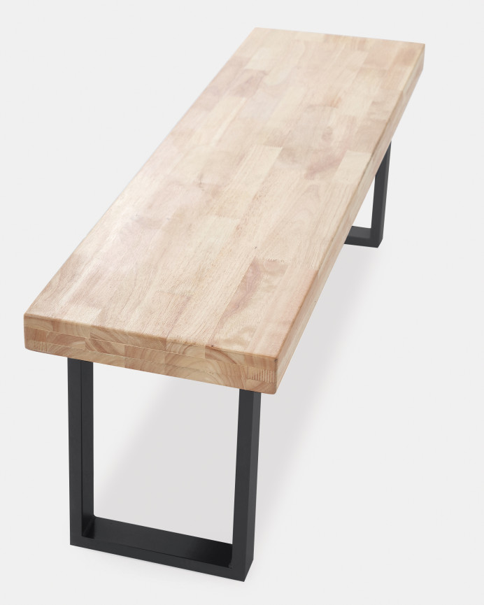 Massive Holzbank in natürlicher Farbe mit schwarzen Eisenbeinen von 47x120cm.