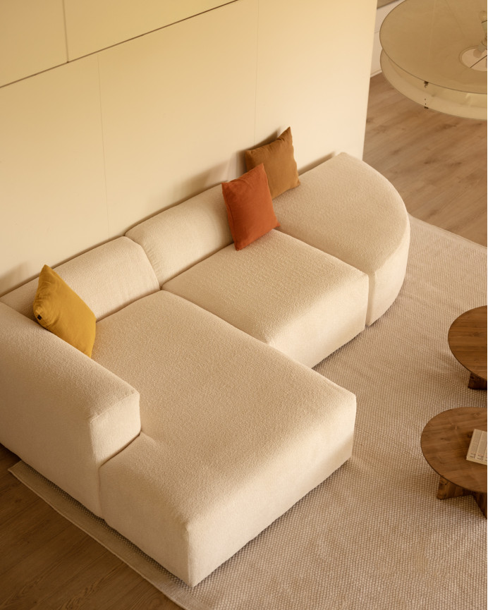Sofa aus 3 gebogenen Modulen mit Chaiselongue aus bouclé in Weiß 320x172cm.