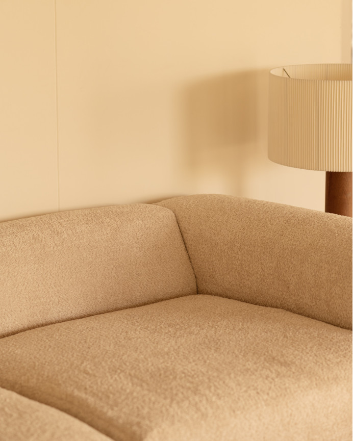 Dreisitzer-Sofa aus bouclé in beige, 330x110 cm.