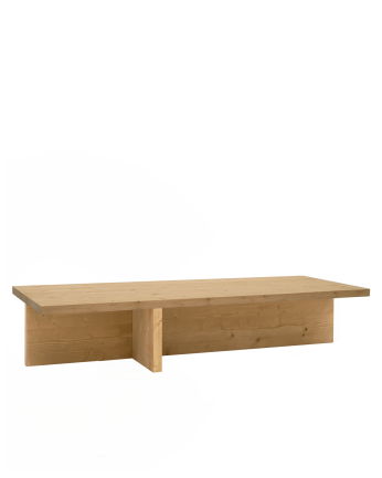 Massiver Couchtisch aus mittelbraunem Eichenholz im Maß 124x27cm.