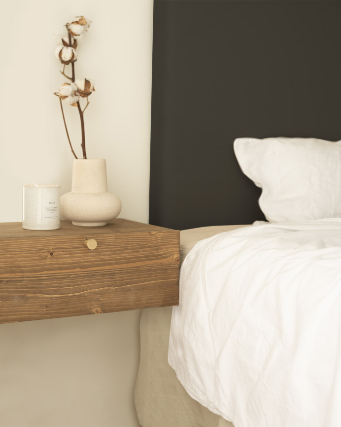 Upholstered headboard in smooth black polyurethane leather in various sizes.