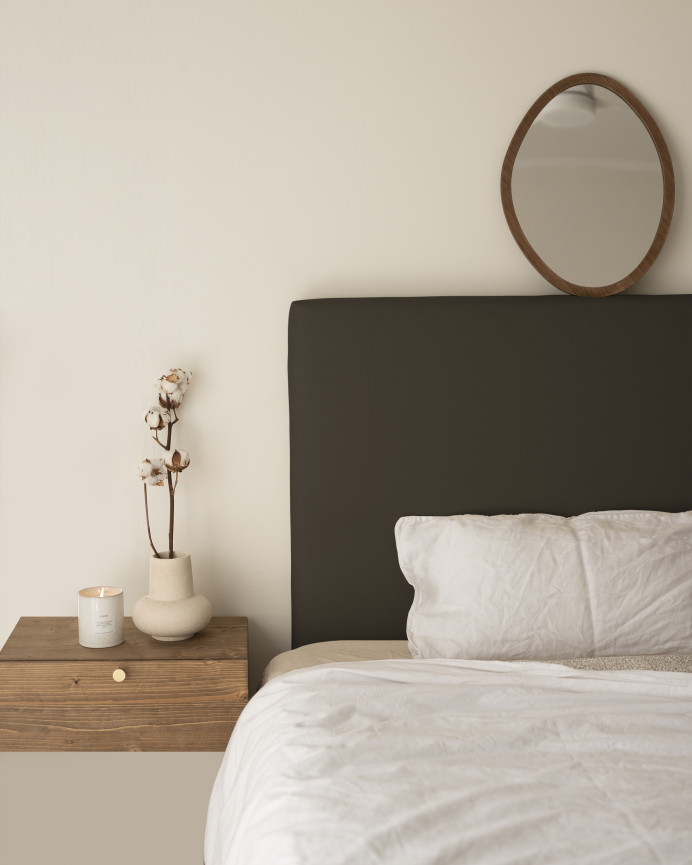Upholstered headboard in smooth black polyurethane leather in various sizes.