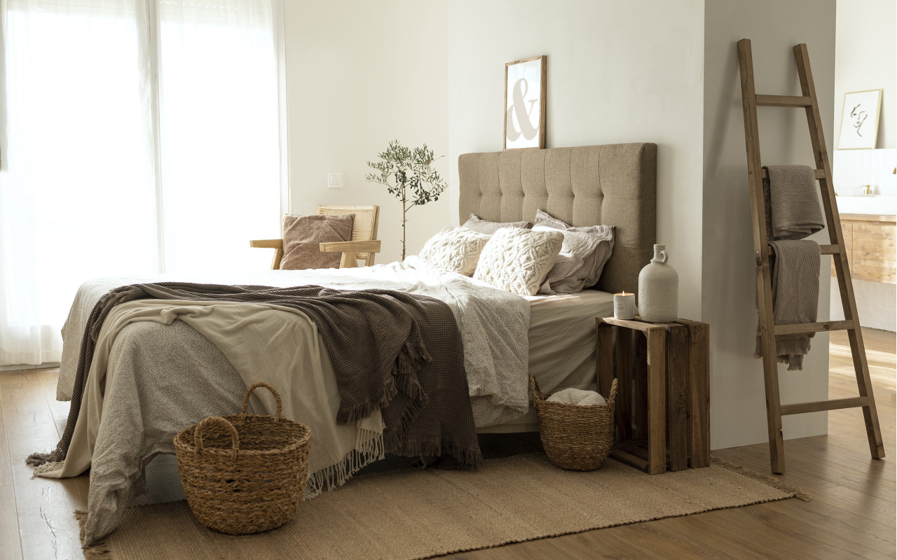 Polyester upholstered headboard with pleats in brown color of various sizes