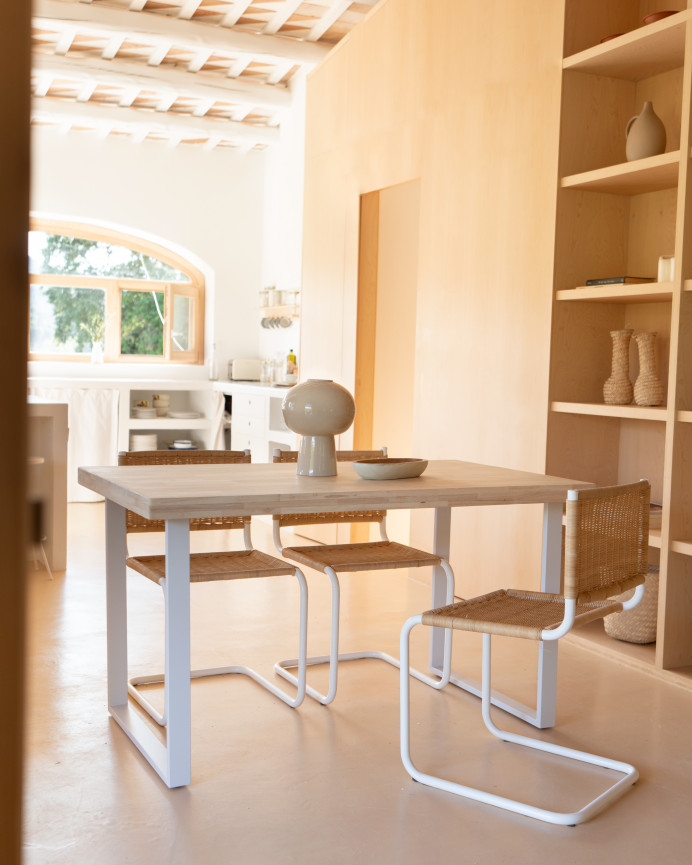 Solid wood dining table in natural tone with white iron legs measuring 140x80cm.