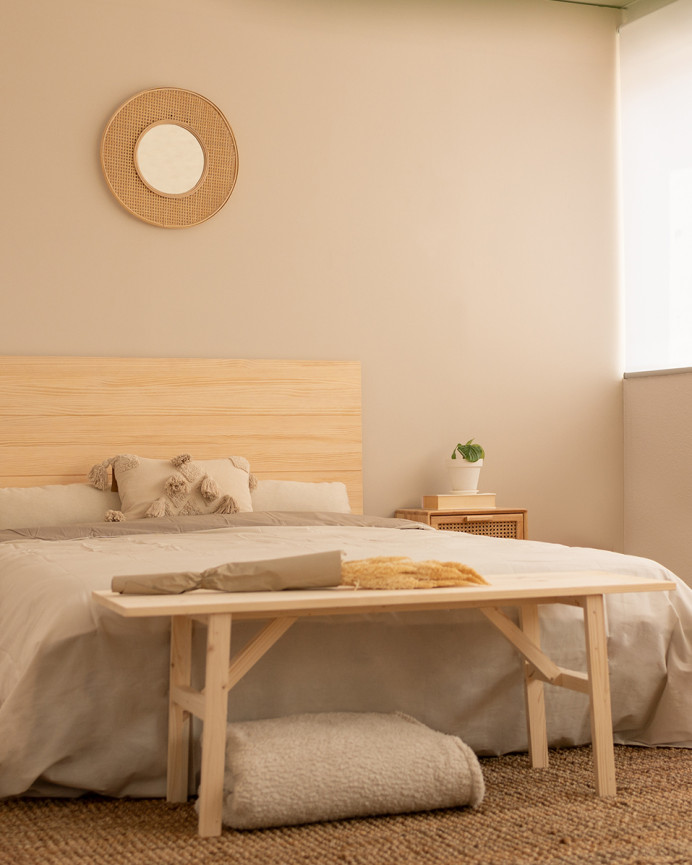 Solid wood headboard in natural tone available in various sizes.