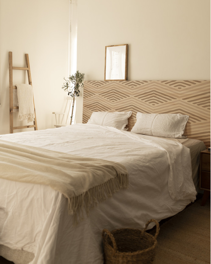 Solid wood headboard with Pyramid Pattern I in a natural tone available in various sizes.