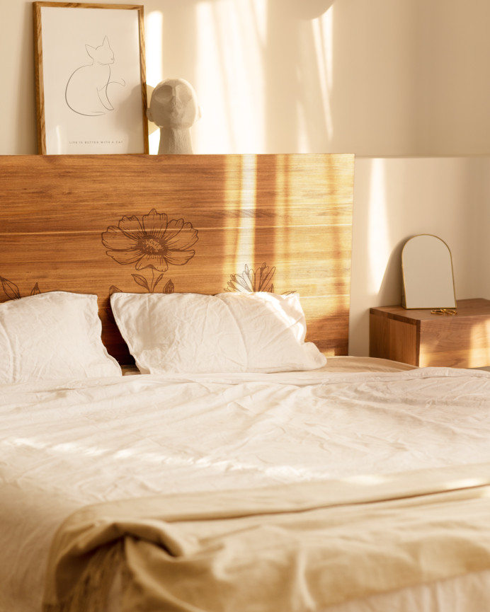 Solid wood headboard with Three flowers pattern in dark oak tone of various sizes.
