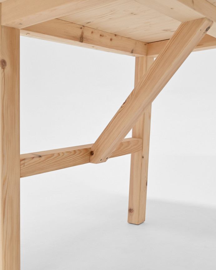 Solid wood dining table in a natural tone available in various sizes