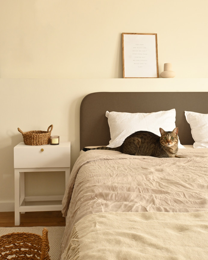 Upholstered horizontal headboard with a wooden frame finished in brown in various sizes.