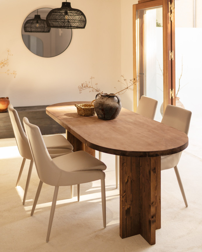 Solid oval dining table made of walnut wood in various sizes.