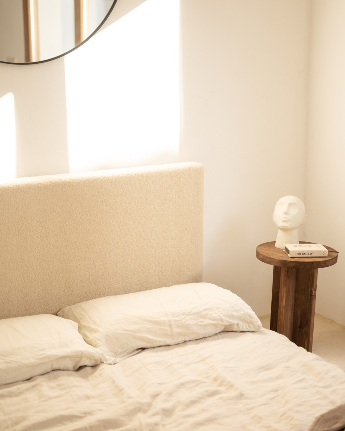 Upholstered cotton headboard in beige color available in various sizes.