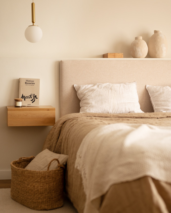 Upholstered beige headboard set and 2 dark oak solid wood floating nightstands in various sizes.