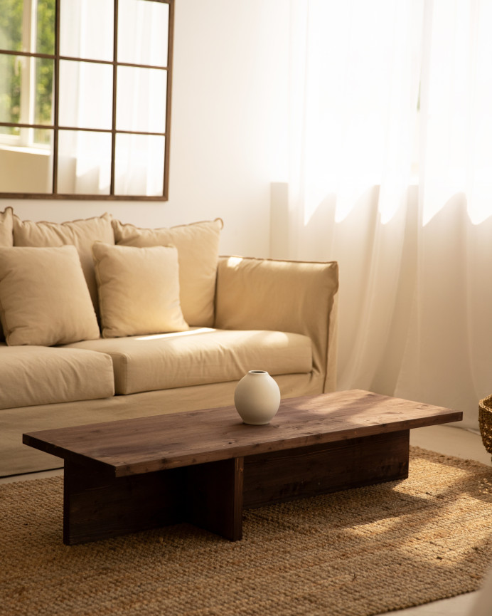Solid wood walnut-toned coffee table measuring 124x27cm.
