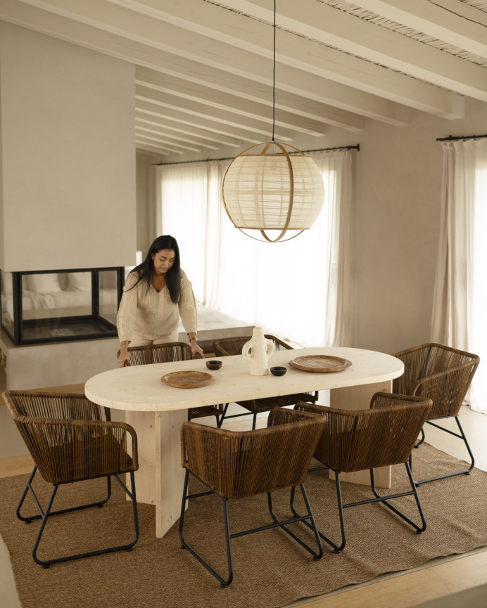 Solid wood dining table in natural tone available in various sizes.