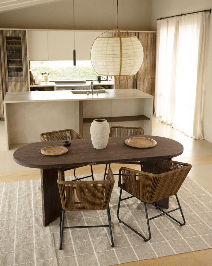 Solid wood dining table in walnut tone available in various sizes.