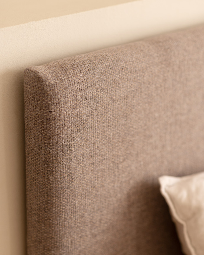 Upholstered headboard in smooth polyester in lavender color of various sizes.