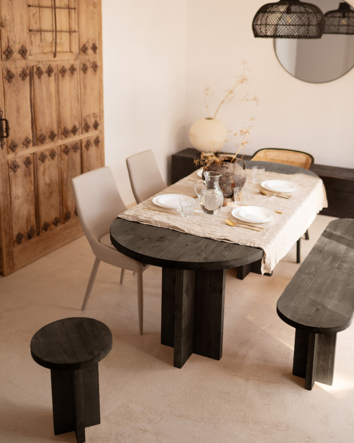 Oval dining table set and solid wood bench in black color available in different sizes.