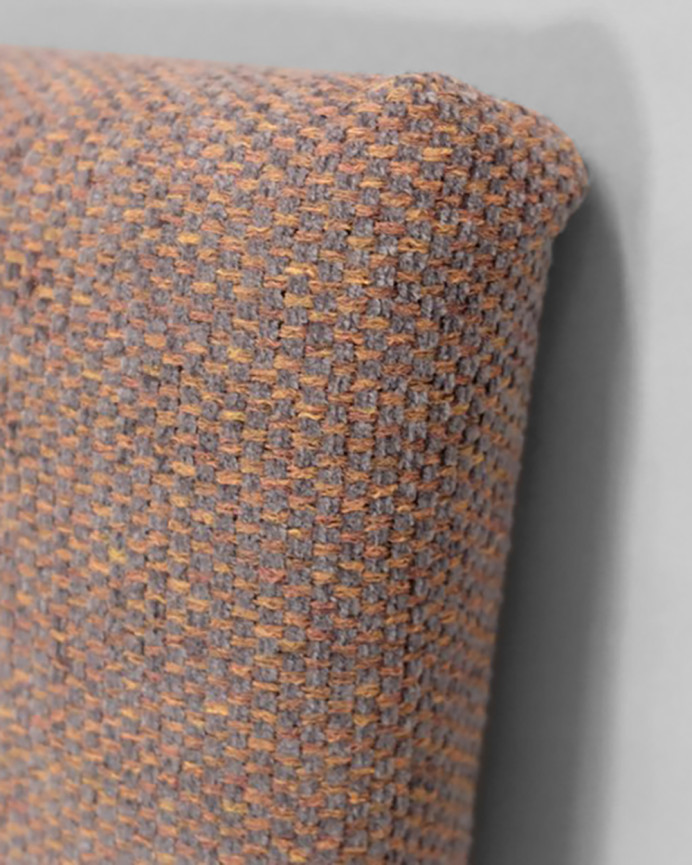 Upholstered headboard in smooth polyester in orange color of various sizes.