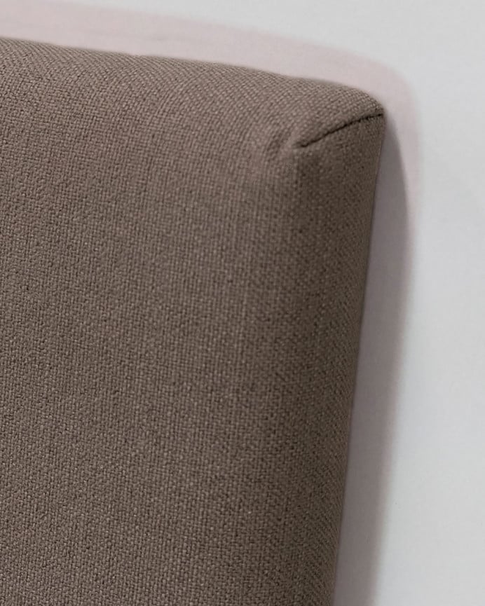 Upholstered headboard in smooth polyester in brown color in various sizes.