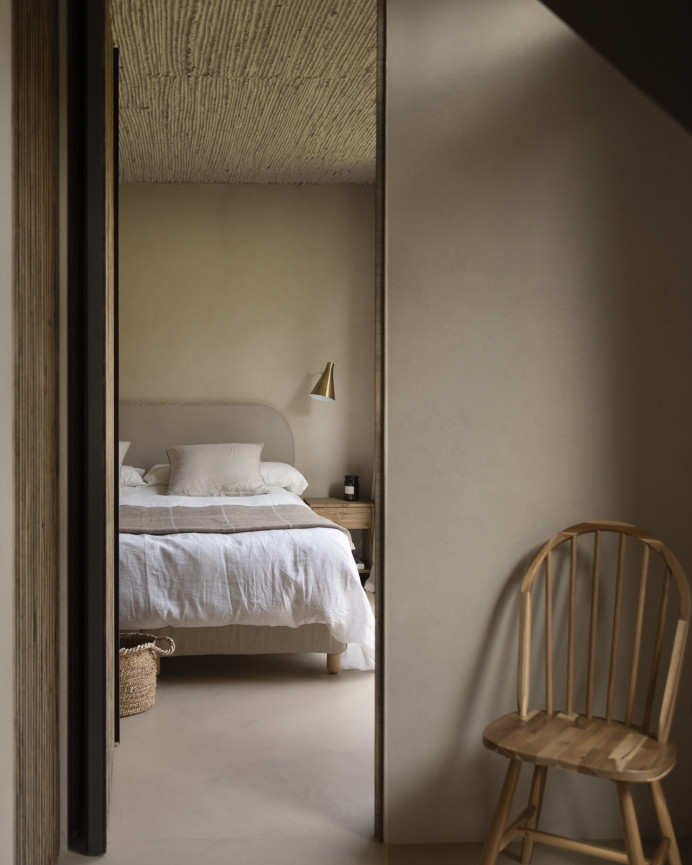 Upholstered headboard with removable cover in brown taupe corduroy fabric, available in various sizes.