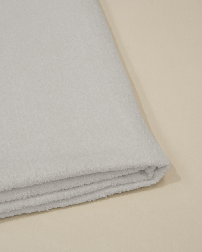 Light gray bouclé headboard cover available in various sizes.