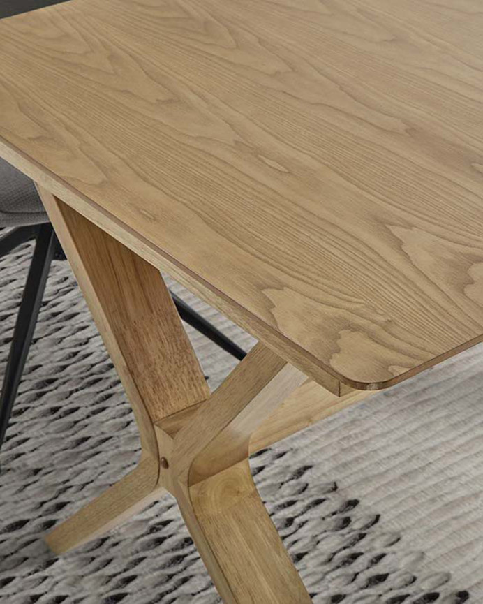 Extendable dining table made of natural wood in various sizes