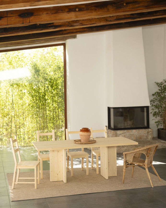 Solid wood dining table in a natural tone available in various sizes
