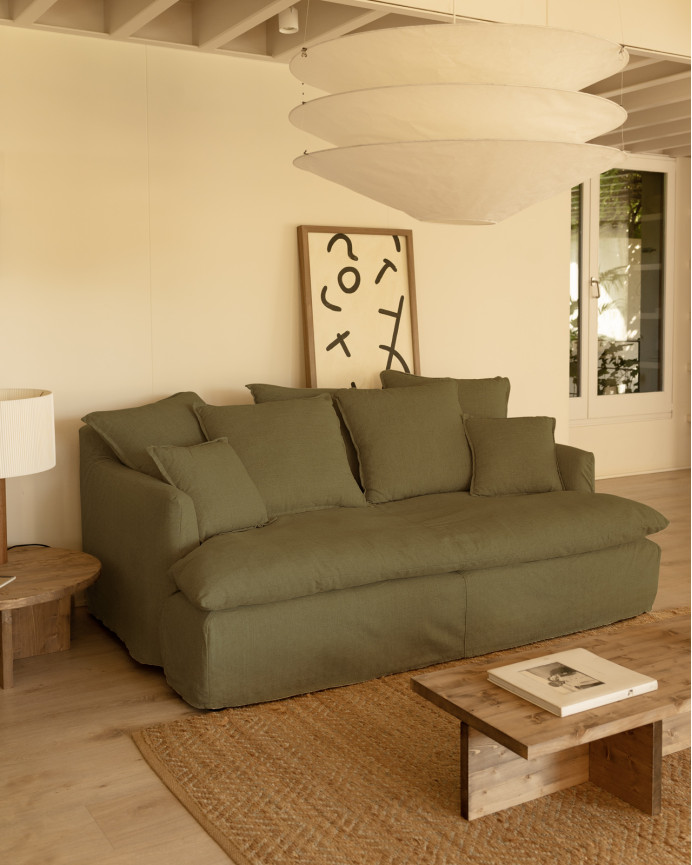 Sofa cover in medium depth cotton and linen in green color of various sizes.