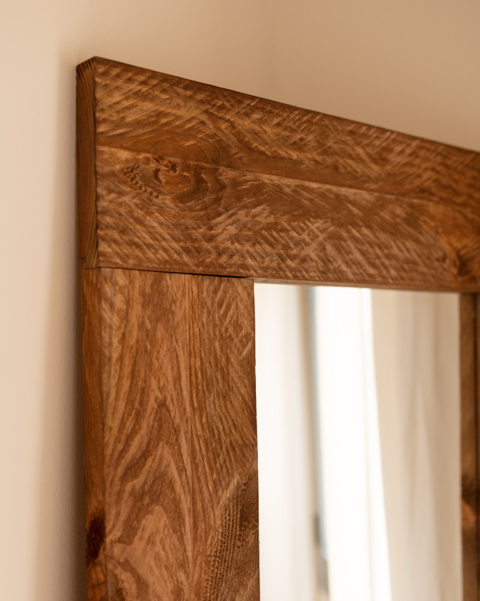 Solid dark oak effect wood mirror measuring 165x65cm.