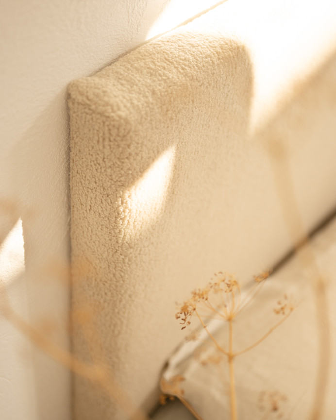 Upholstered cotton headboard in beige color available in various sizes.