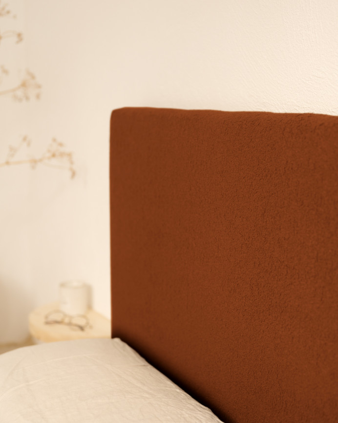 Upholstered cotton headboard in terracotta color available in various sizes.