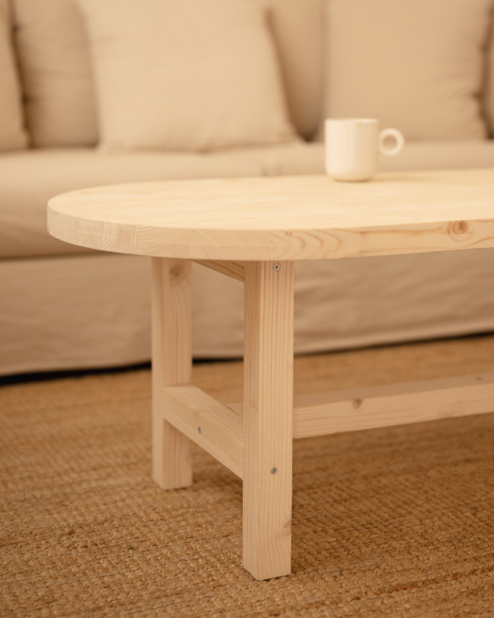 Solid wood natural tone coffee table measuring 120x40cm.