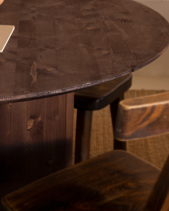 Round solid wood dining table in walnut tone, 110cm.