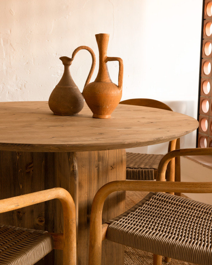 Round solid wood dining table in dark oak tone, 110cm.