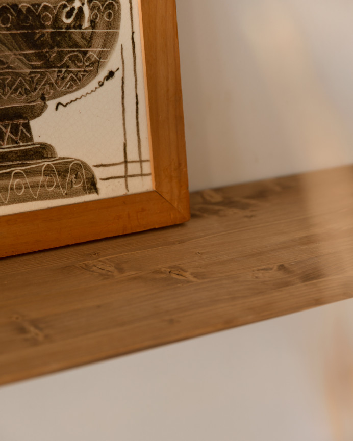 Round solid wood console table in dark toble tone with a length of 100cm.