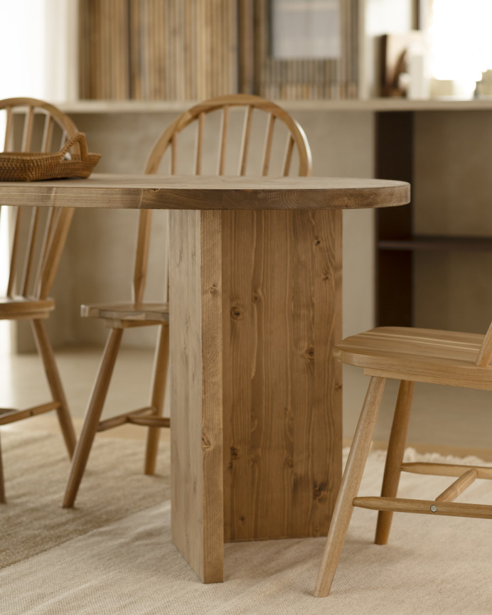 Solid wood dining table in a dark oak tone available in various sizes.
