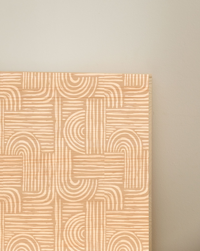 Solid wood headboard with various sizes printed on it.