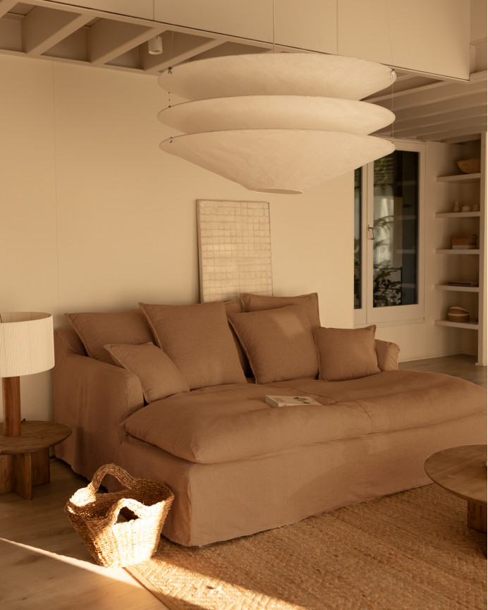 Sofa cover with long cotton and linen background in terracotta color available in various sizes.