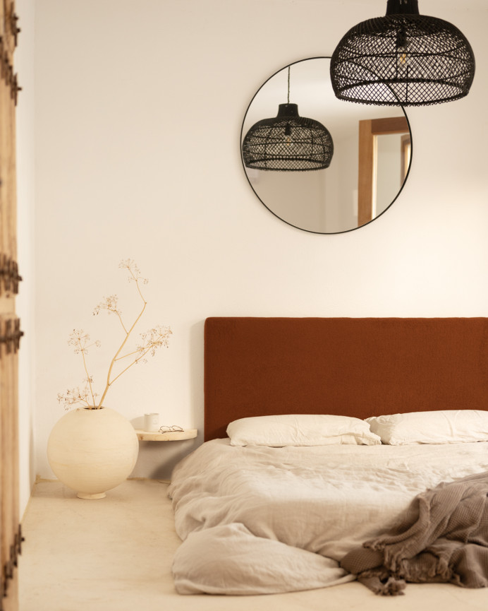 Upholstered cotton headboard in terracotta color available in various sizes.