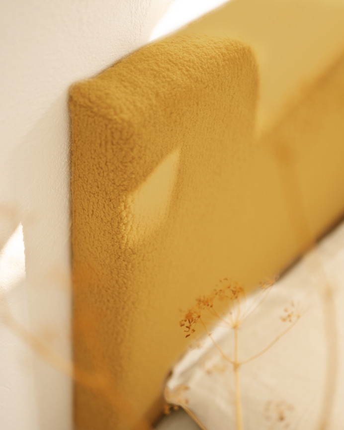 Upholstered cotton headboard in mustard color available in various sizes.