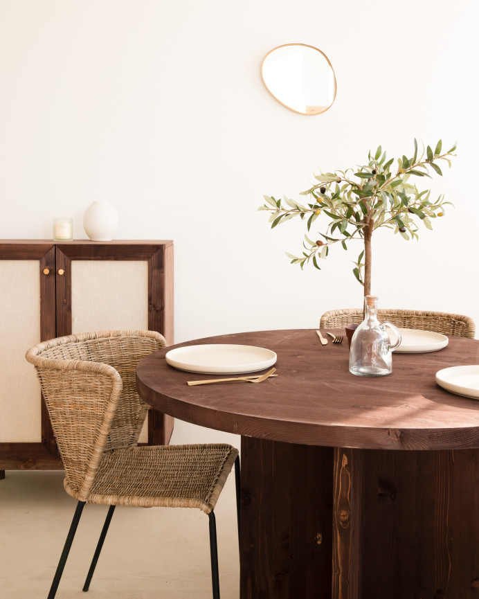 Solid walnut round dining table with a diameter of 110 cm.