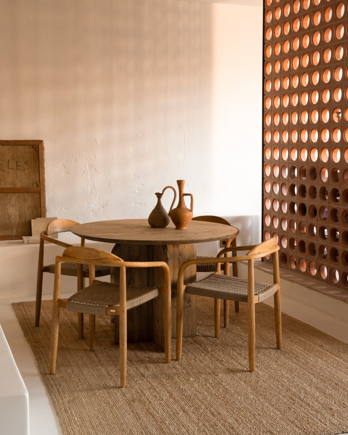Round solid wood dining table in dark oak tone, 110cm.