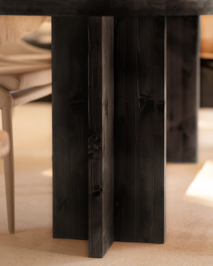 Oval dining table set and solid wood bench in black color available in different sizes.
