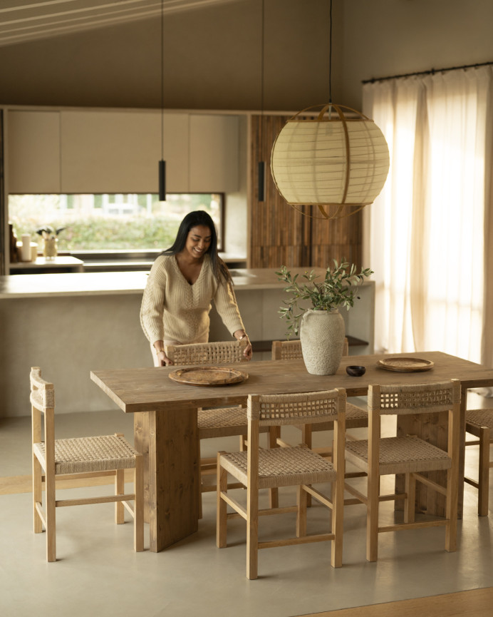 Solid wood dining table in dark oak tone available in various sizes.