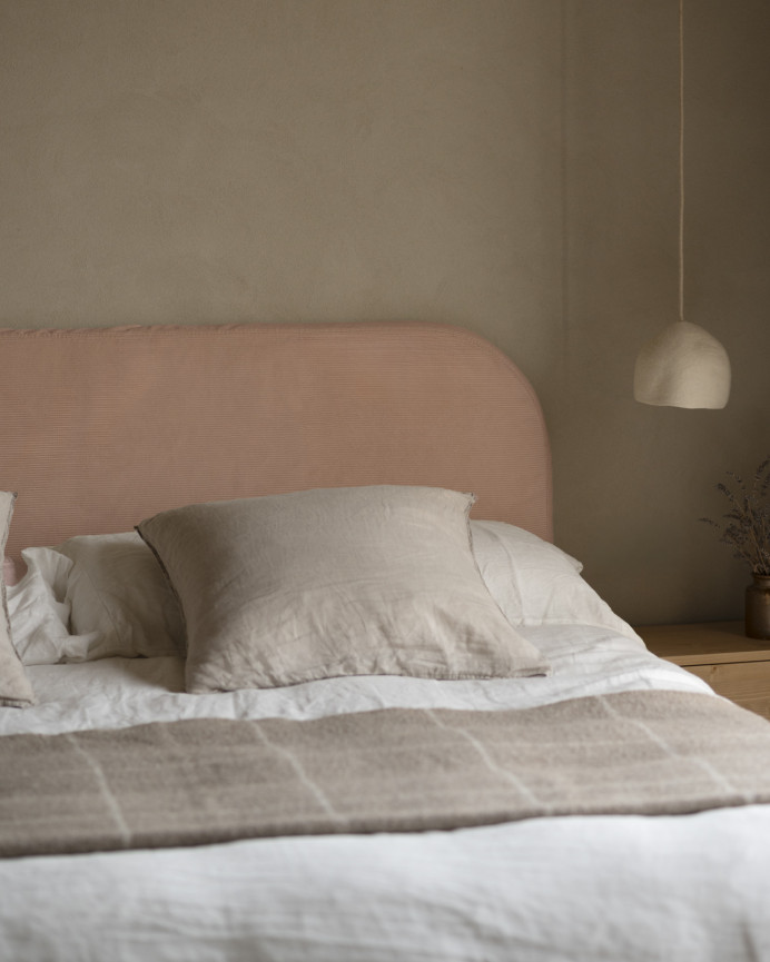 Upholstered headboard with removable coral corduroy cover, available in various sizes.