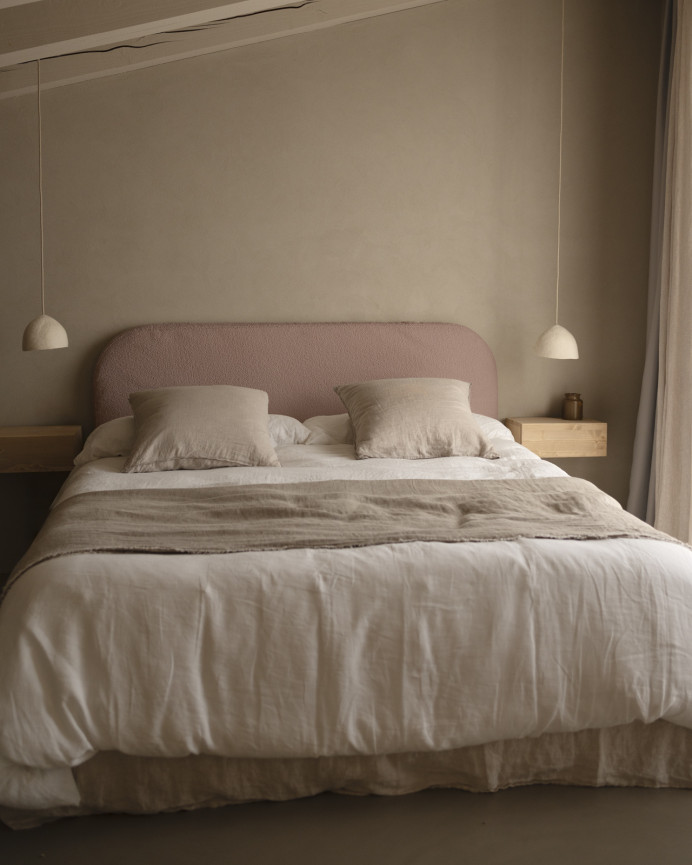 Pink bouclé headboard cover available in various sizes.