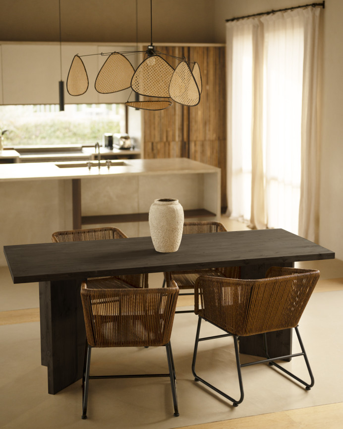 Solid wood dining table in black tone available in various sizes.