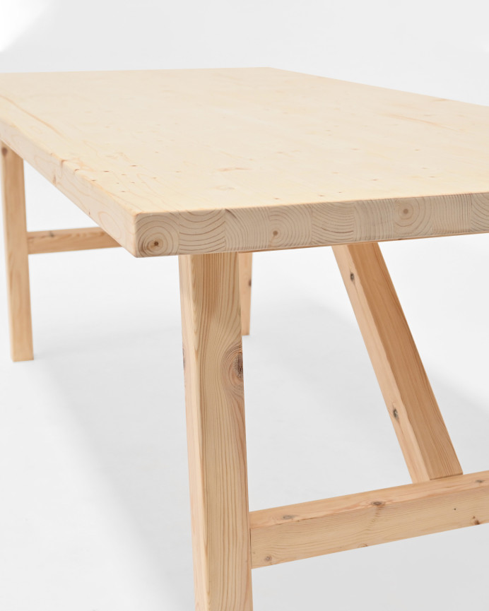 Solid wood dining table in a natural tone available in various sizes