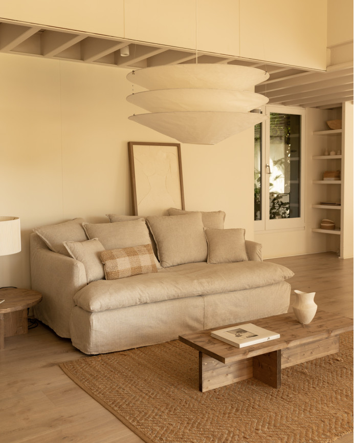 Sofa cover with medium depth in cotton and linen, beige color available in various sizes.