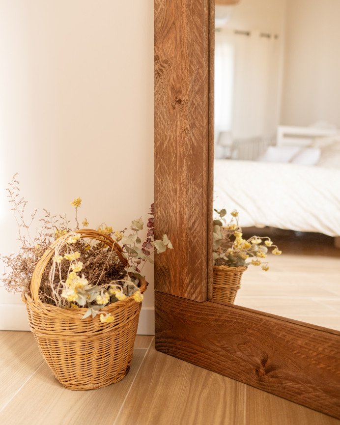 Solid dark oak effect wood mirror measuring 165x65cm.